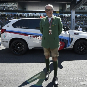 motogp-austrian-gp-2016-carmelo-ezpeleta-in-traditional-austrian-clothing.jpg