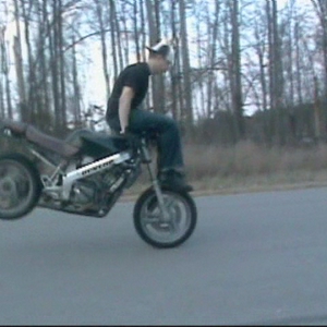 stoppie over handlebars.jpg