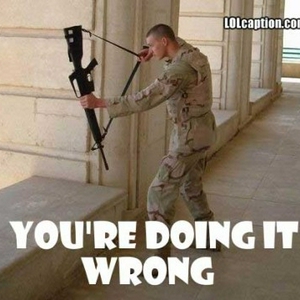 funny-picture-marine-machine-gun-crossbow-fail-420x360.jpg